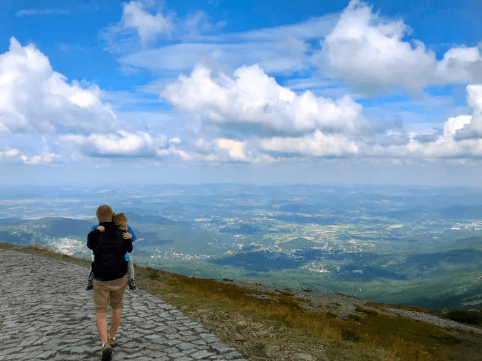 Carrying my 4y old daughter down the mountain trail.