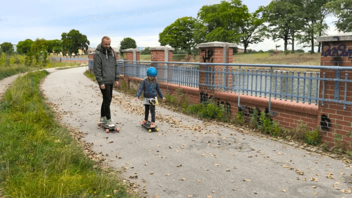 Park, on the skateboard with my daughter.